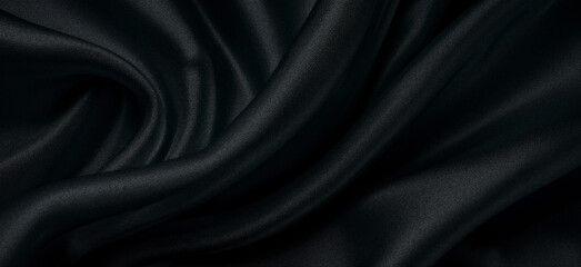Obraz premium Black fabric background with a cross-sectional texture.