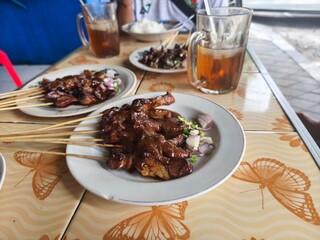 A feast of Sate Kambing or goat satay awaits.