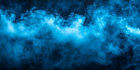 Obraz premium Abstract blue smoke swirls on black background.