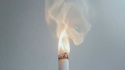 Close-Up of a Burning Cigarette with Glowing Tip