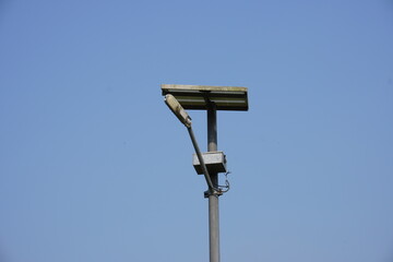 A solar street light, which is an outdoor lighting system powered by solar energy