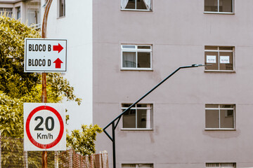 Naklejka premium Traffic signs indicating the maximum permitted speed and identification of apartment blocks within the condominium 1 