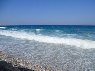 Spectacular beach view with waves and clear sky