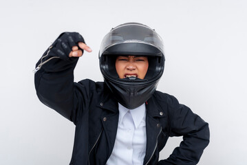 Irate motorcyclist gesturing and expressing anger in full helmet and gear