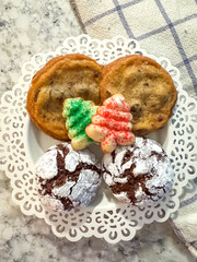 Chocolate Chip, Chocolate Crinkle and Spritz Tree Cookies on a plate