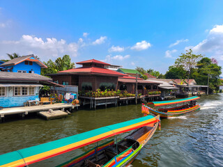 The beautiful view of two long tail boat and house riverside at Khlong bang luang river, bangkok.