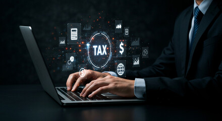 A businessman using a laptop with digital tax icons, finance symbols, and accounting visuals. Ideal for themes related to tax filing, financial management, online business accounting, and taxation 