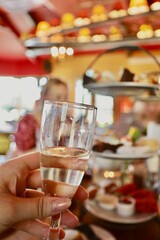 pouring champagne into glass