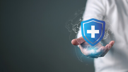 The concept of health insurance and medical welfare, Man is holding plus icon represents protection...