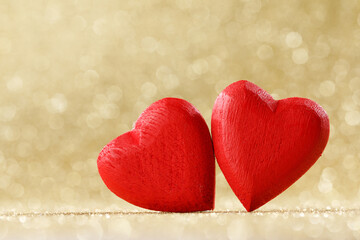 wooden hearts on bokeh background close up