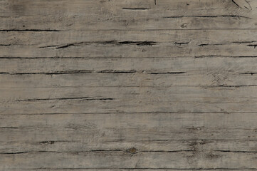 The photo shows the texture of old wooden boards close-up