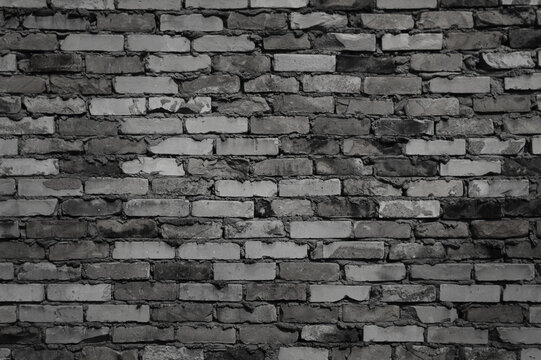 brick wall made of white and black brick close up