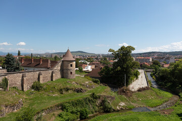 Romania Corvin Castle on a cloudy summer day