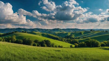 Obraz premium Green Hills Meadows Under Blue Sky White Clouds Panorama Banner