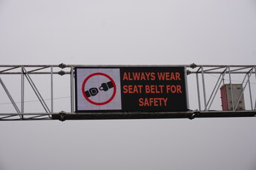LED screen warns drivers and passengers to wear seat belts for safety