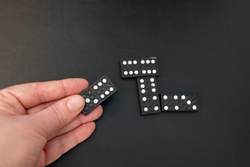 looking for a matching tile to make a link in a game of dominoes