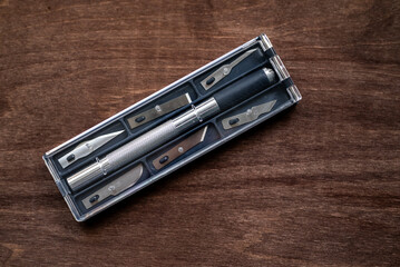 utility knife (also known as precision or exacto knife) with interchangeable blades
