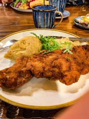 Pork chop with potatoes.