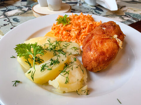 Devolay rolls with potatoes and  carrot salad.
