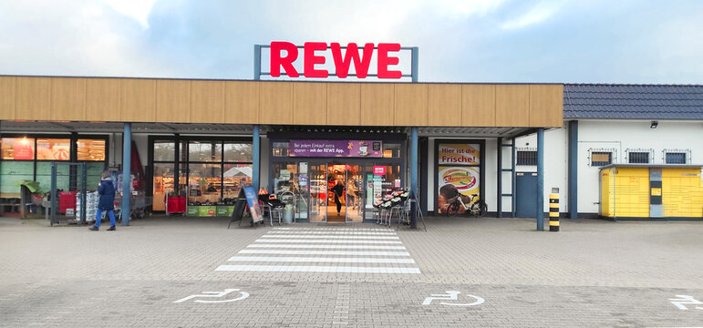 Germany, Minden - December 17, 2024: REWE is a supermarket chain in Germany and the main brand of Rewe Group headquartered in Cologne	
