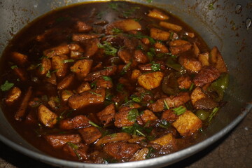 nice presentation of creamy, spiced paneer curry bursting with flavors, paired perfectly with soft, warm roti for a comforting and delicious meal.