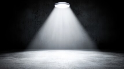 Dramatic Spotlight Illuminating Empty Stage in Dark Environment
