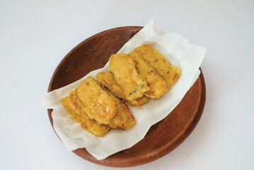 Delicious fried tempeh or fried tempeh is ready to eat, with a white background.