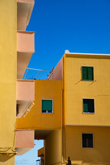 beautiful Procida island with colorful houses in sunny summer day, Italy