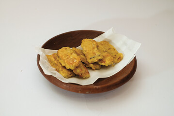 Delicious fried tempeh or fried tempeh is ready to eat, with a white background.
