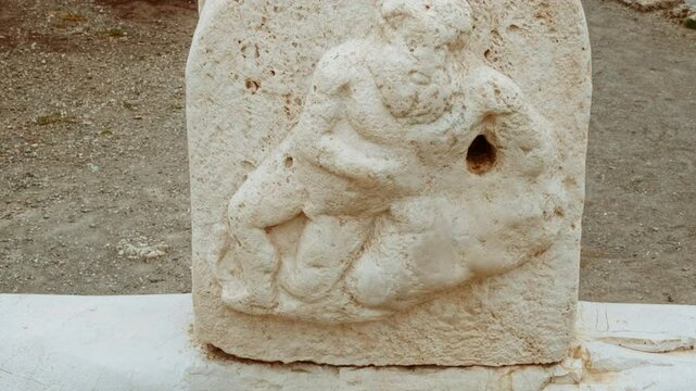 Marble relief of Silenus on pilaster of fountain, Via della Fortuna, Pompeii, Naples, Campania, Italy, an ancient Roman city buried by Vesuvius in 79 AD