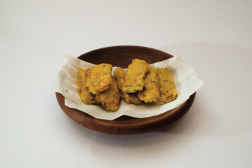 Delicious fried tempeh or fried tempeh is ready to eat, with a white background.
