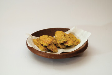 Delicious fried tempeh or fried tempeh is ready to eat, with a white background.