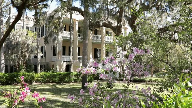 A historic antebellum home known as The Castle or the Joseph Johnson House is seen with azalea blooms in Beaufort, South Carolina.