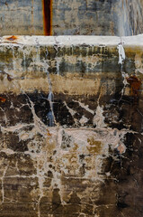 Obraz premium Texture of rust on weathered concrete structure with worn and weathered surface