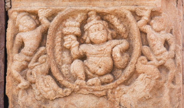 Traditional Indian art on wall of abandoned temple, India. 