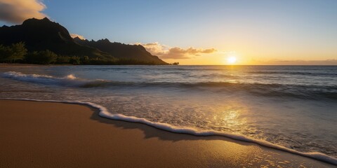 Gentle waves ripple on the shore with a golden sunset over distant mountains creating a serene view.