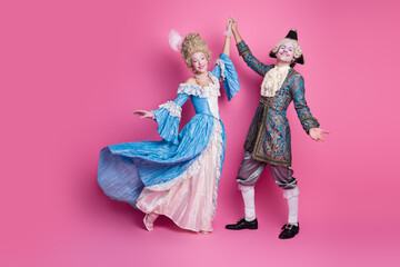 A couple in elegant historical costumes dance against a lively pink background, representing a...