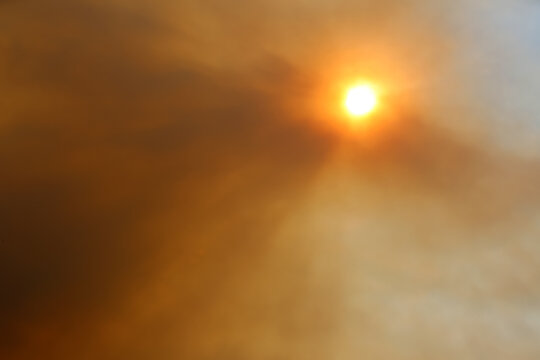 RED SUNLIGHT - COVERED BY FIRE SMOKE AROUND THE PORTUGAL - Powered by Adobe