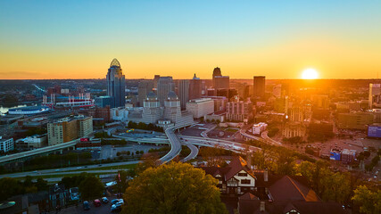 Aerial of Cincinnati Skyline at Sunset with Golden Glow