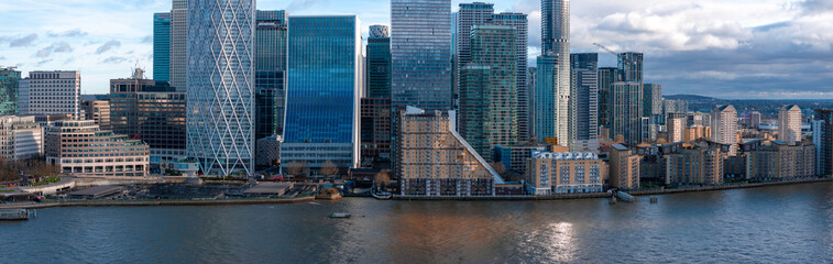Panoramic view of modern skyscrapers in Canary Wharf, London, including One Canada Square,...