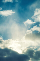 Sky background, dramatic sunset sky in picturesque tones, fantastic sunset clouds with evening sunlight