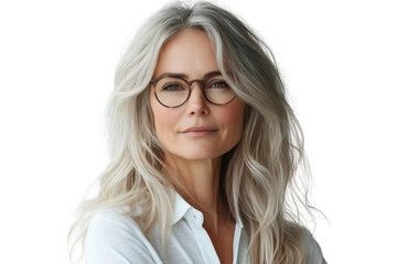 Fototapeta premium Confident older woman with long, silver hair and glasses, exuding a sense of wisdom and tranquility in a modern setting, isolated on a white background.