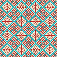 Colorful geometric ethnic seamless pattern designed for background, wallpaper, traditional clothing, carpet, curtain, and home decoration.