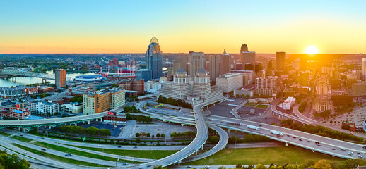 Aerial Cincinnati Skyline at Sunset with Ohio River and Highways