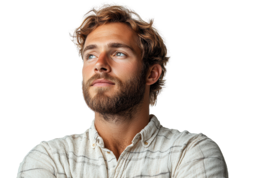 Thoughtful young man with a beard gazes into the distance, exuding confidence and contemplation against a white background.