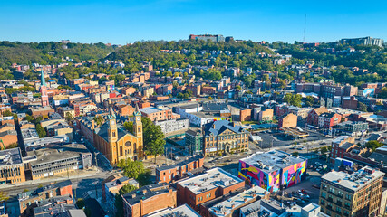 Aerial Vibrant Cincinnati Church and Mural with Lush Hillside