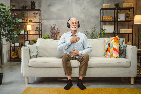 senior male eyes closed have guided training yoga or meditation