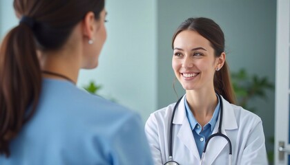 Fototapeta premium professional female doctor with stethoscope listens attentively to patient, medical consultation, healthcare, trust and professional care