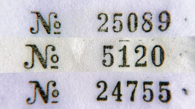 Stop motion animation of Old Rubber Stamp Numbers on white paper background. Sequence of Stamped Numbers Seamless Loop.