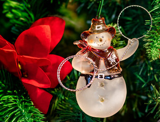 Cowboy Snowman Christmas Ornament with Lasso on Festive Tree